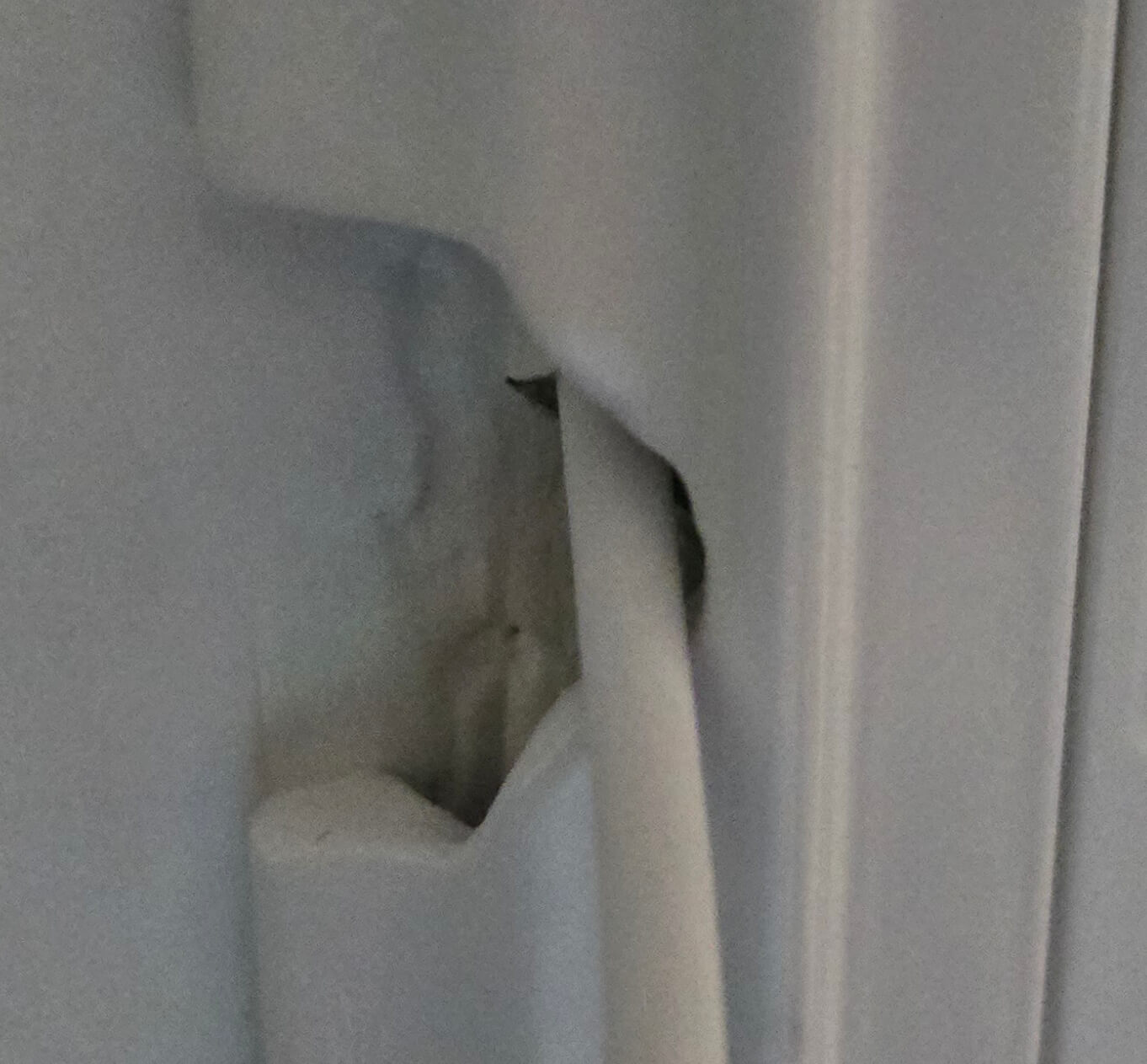 an outlet cover, with a notch cut into it