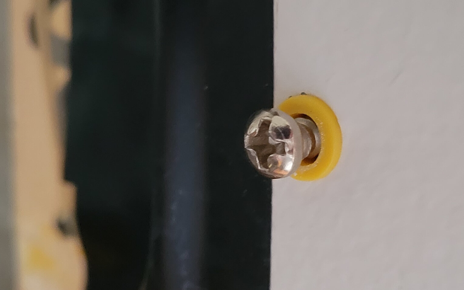 a drywall screw and anchor in drywall