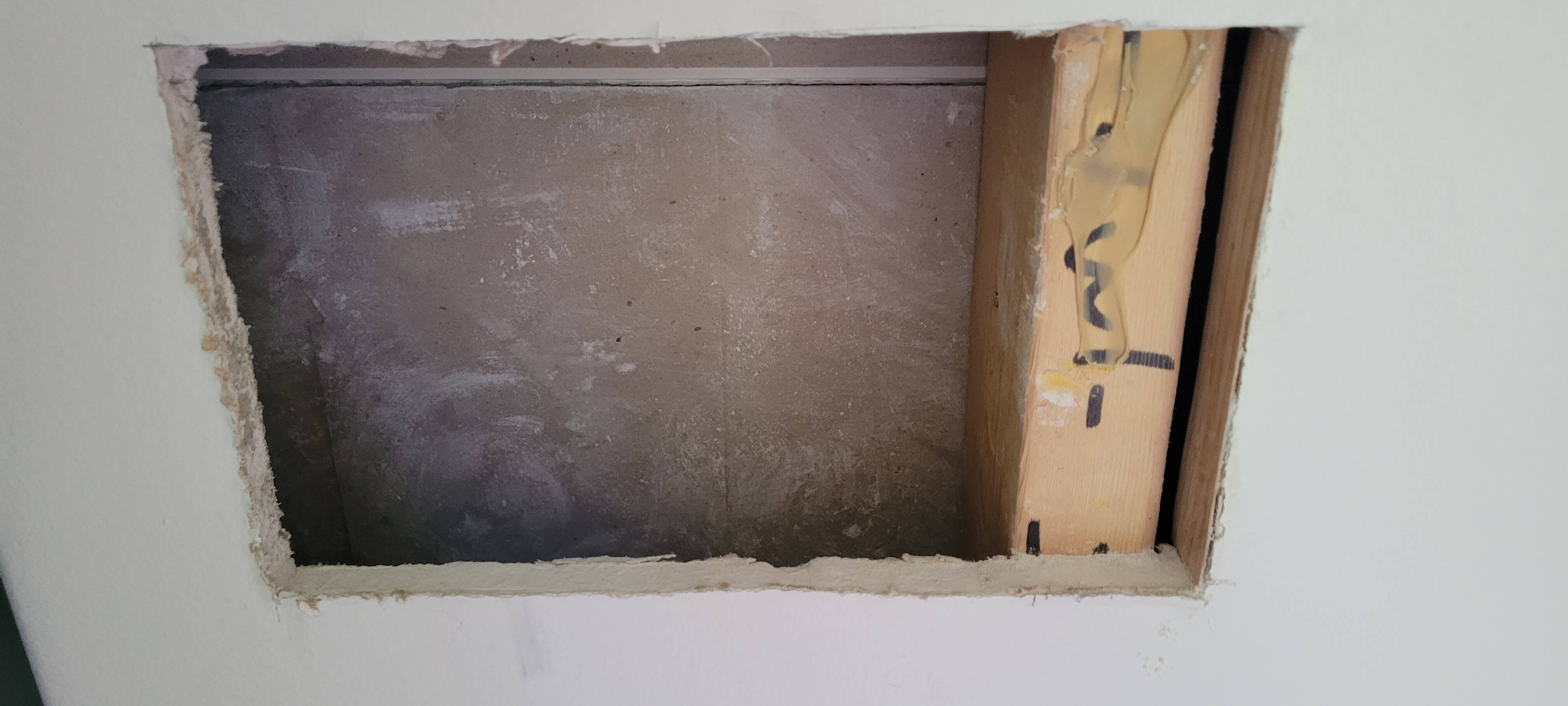 a rectangular hole in drywall